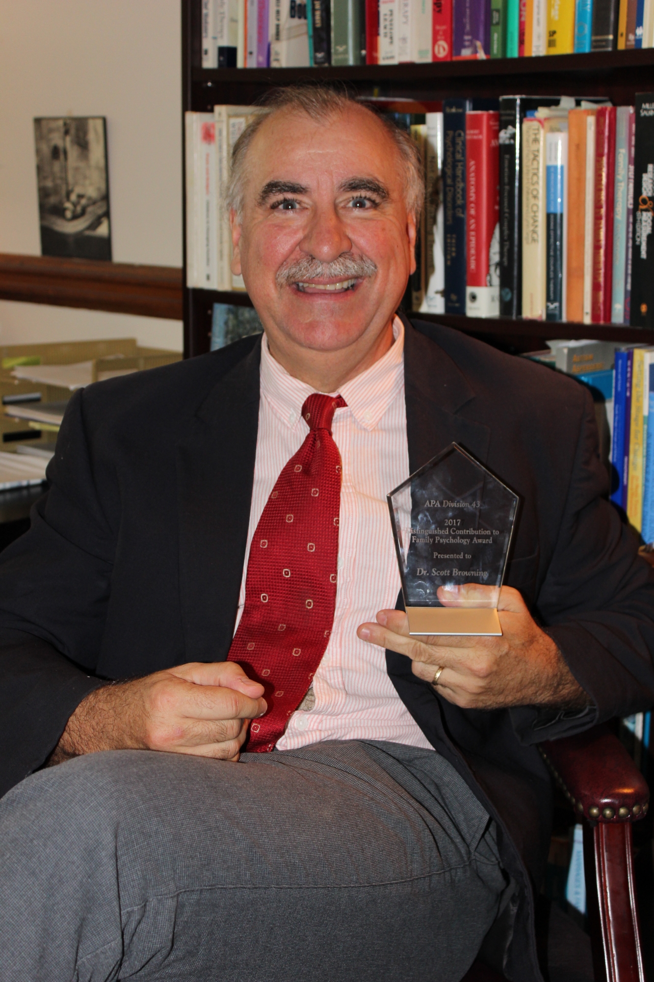 Dr. Browning poses with his award.