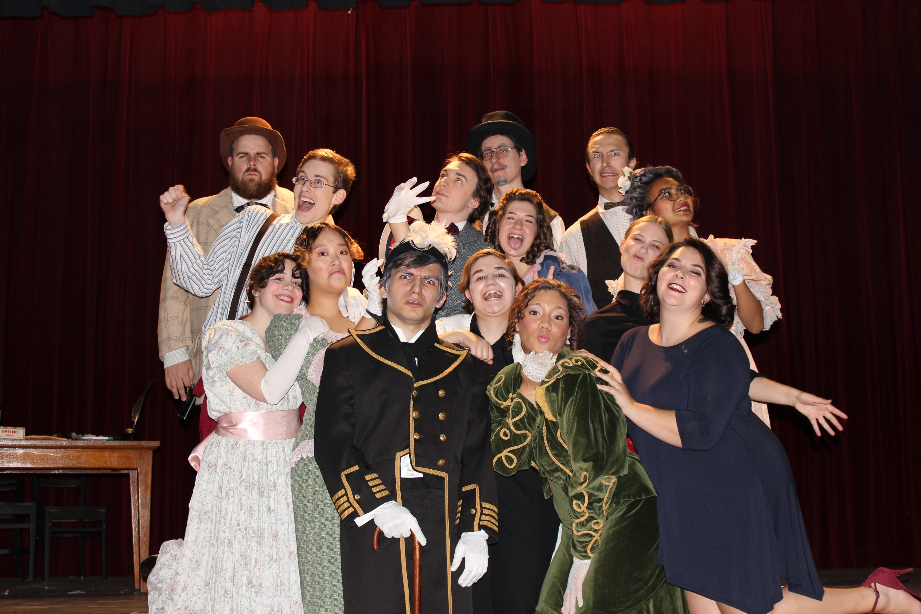 Cast members of "The Matchmaker" ham it up prior to their opening night performance.
