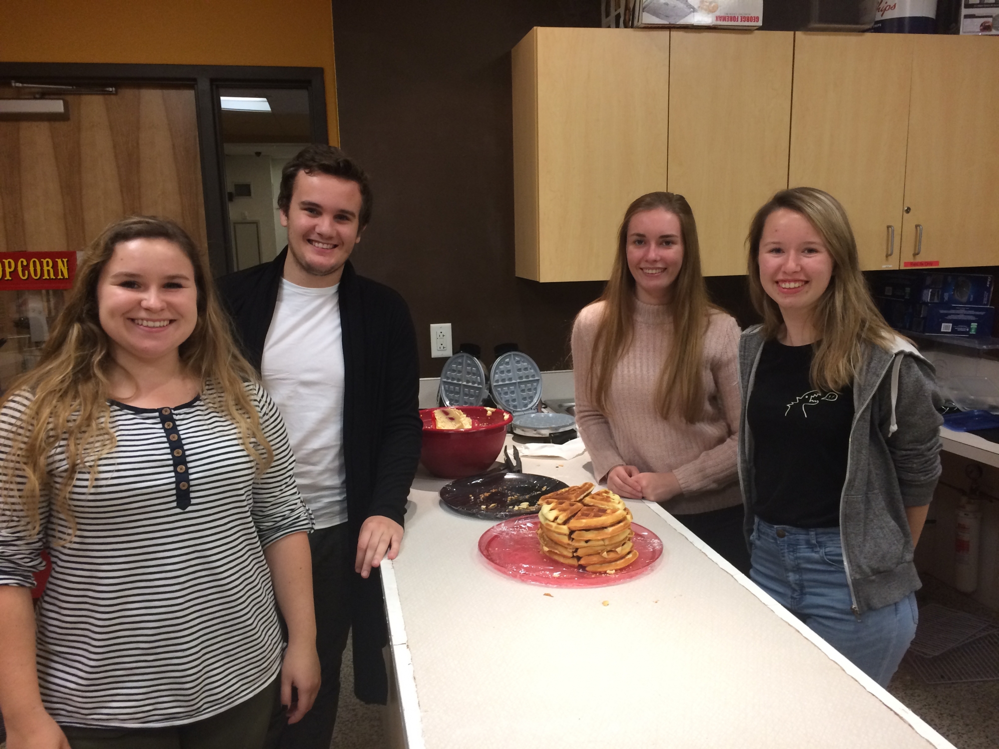 Belgian students Elise Grymonprez, Tijs Toulouse, Eline Vercaemer, Tessa Gesquire prepare delicious waffles based on a recipe from their home country.
